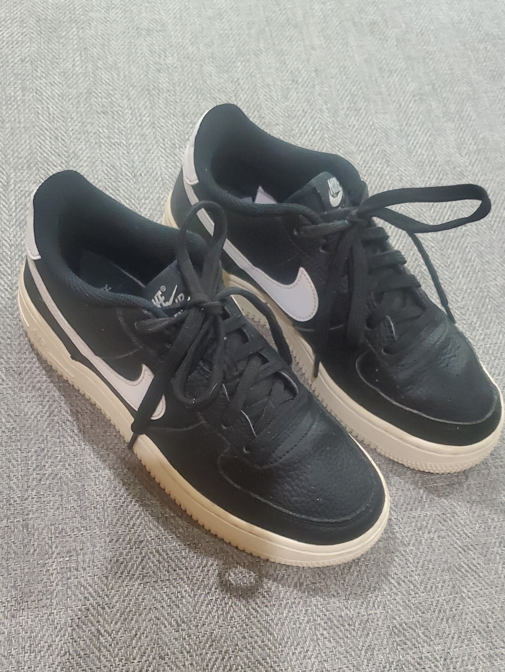 NIKE AIR FORCE 1 Black Sneakers with White Swoosh and Cream Sole
